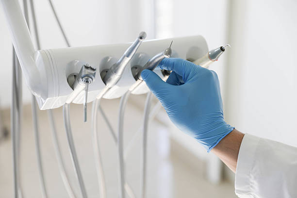 Professional Tooth Extraction technician working in Durham, OR